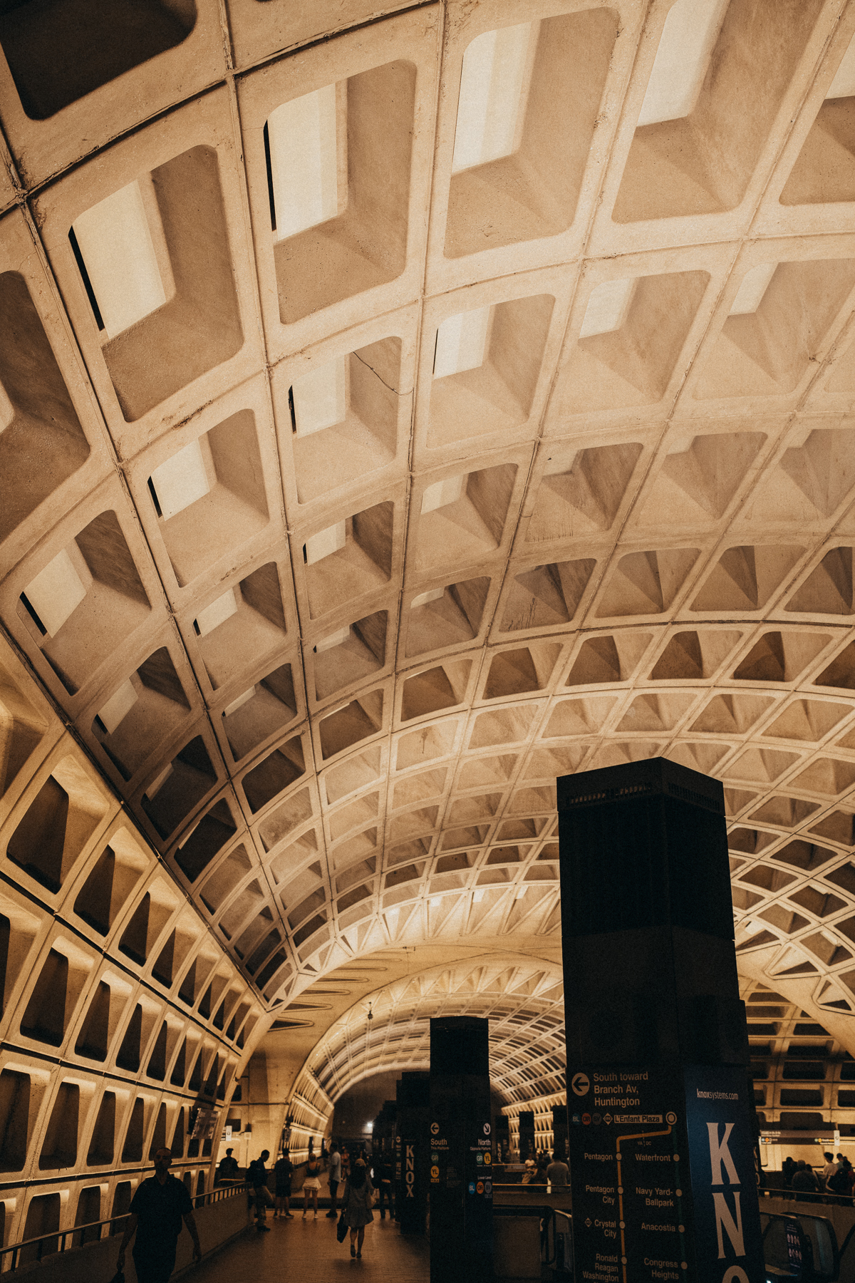 The illuminated concrete vaults and platforms of L’Enfant Plaza Metro station